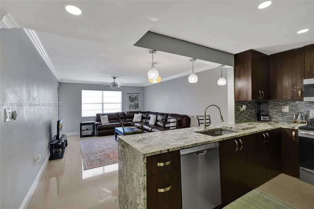 Photo of 4314 NW 9th Ave #3-3D, Deerfield Beach, FL 33064 (MLS # A11897562)