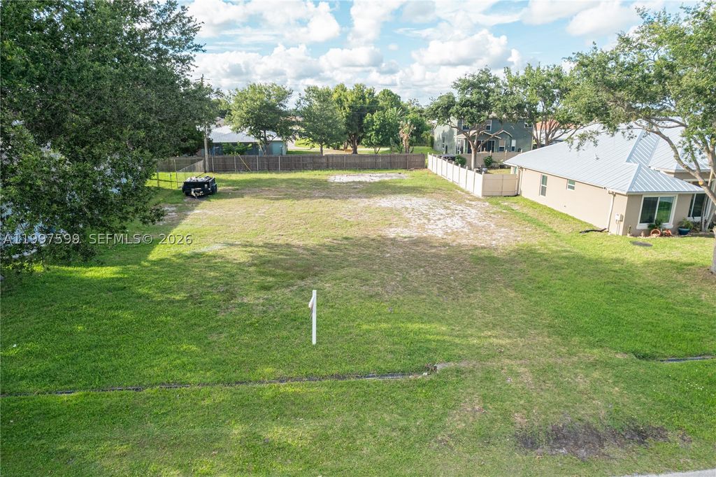 Photo of 399 SW Ridgecrest Dr, Port St Lucie, FL 34953 (MLS # A11997599)