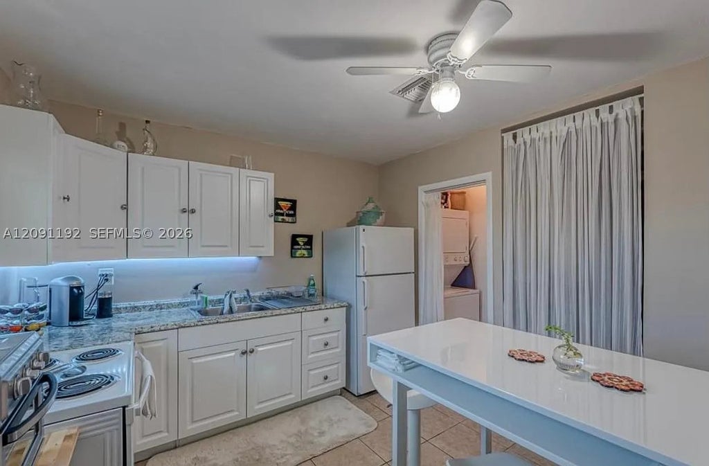 Photo of 1411 NW 10th St #F, Dania Beach, FL 33004 (MLS # A12091192)