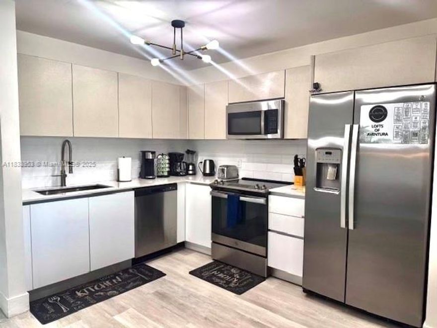 MIX USE UNIT!!! WORK AND LIVE UNIT !!! 980SFT BRAND NEW UNIT . You can choose to only live as a residence or you can live and work !!! Professional building . Pets are allowed , washer and dryer in the unit. Centrally located close to the beaches and Aventura mall!!! Amenities on site: Swimming pool and barbecue . It won't last!!! call today easy to show . Unit is currently rented at $2,150 monthly . Low HOA . 1 parking space .