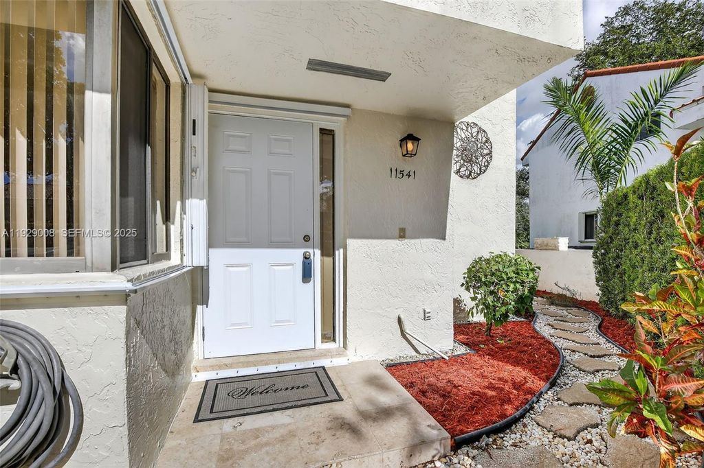 Photo of 11541 Terra Bella Blvd #25, Plantation, FL 33325 (MLS # A11929008)