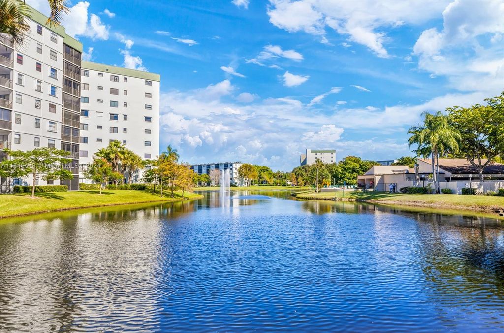 Photo of 2228 N Cypress Bend Dr #206, Pompano Beach, FL 33069 (MLS # A11546413)