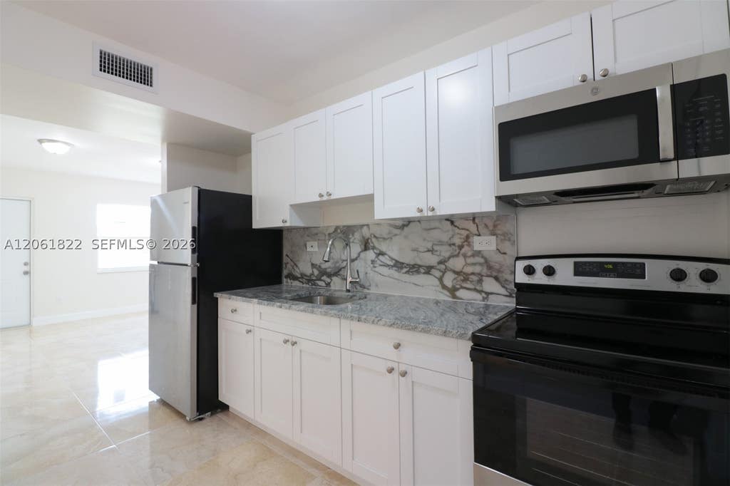 Photo of 3014 NW 6th St, Pompano Beach, FL 33069 (MLS # A12061822)