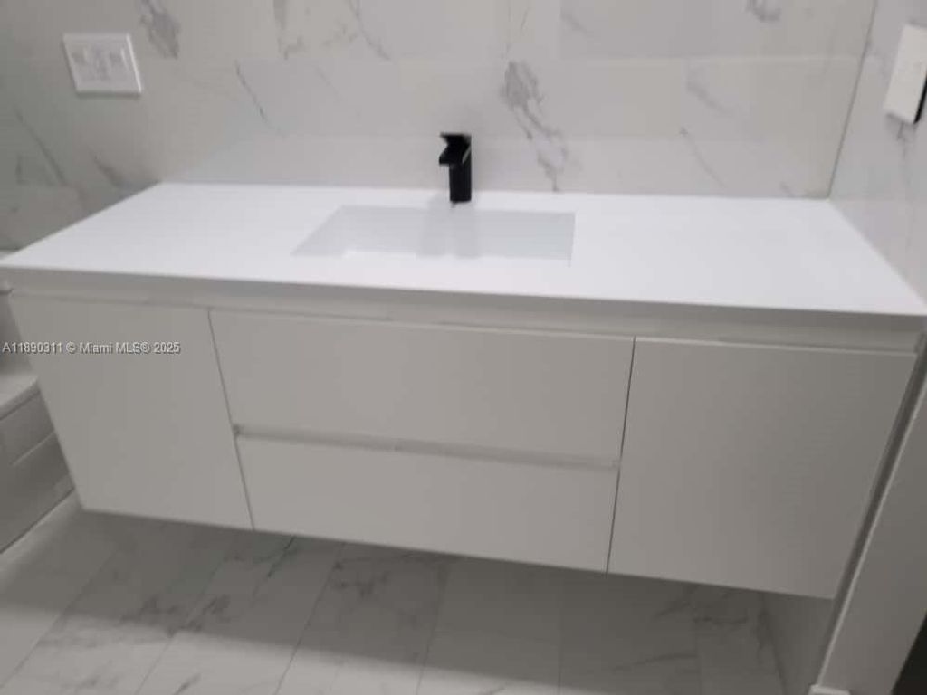 Photo of 1236 N Hiatus Rd #1236, Pembroke Pines, FL 33026 (MLS # A11890311)