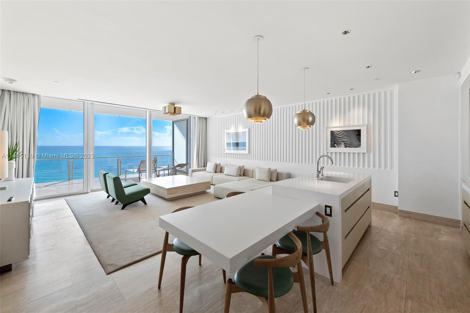 Enjoy FOUR SEASONS HOSPITALITY in this OCEANFRONT 1 Bedroom + DEN, 2.5 Bath Hotel Residence furnished by Parisian architect, Joseph Dirand. Featuring breathtaking panoramas of the ocean, this fully-appointed Hotel Residence is the perfect pied-Ã -terre for anyone looking to experience the magic of The Surf Club. Owners enjoy the flexibility of putting their Residence in the Four Seasons-managed rental program when they are not staying in it. Residents can enjoy the privacy of their own home as well as the comfort of Four Seasons amenities including fully-serviced pools & beach, an exclusive fitness center, various restaurant outlets including The Surf Club Restaurant by Chef Thomas Keller & a Four Seasons Spa.
