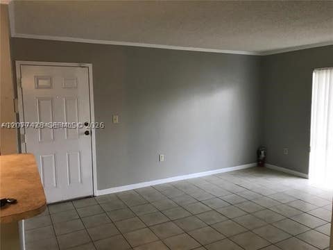 Tiny photo for 7235 NW 179th St #101, Hialeah, FL 33015 (MLS # A12077423)