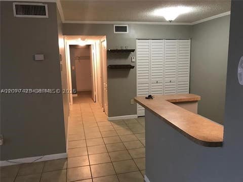 Tiny photo for 7235 NW 179th St #101, Hialeah, FL 33015 (MLS # A12077423)