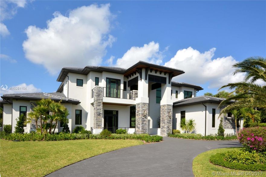 Built in 2016, this stunning modern architecture, contemporary home will captivate you from every angle.  Home features 7 bedrooms and 8.5 bathrooms. 4 car garage. 1000 bottle glass wine room and beautiful infinity edge pool and spa for entertaining.  The best golf course views that Parkland Golf and Country Club has to offer, this home has nearly 8000 s/f under air.  Finest quality construction on the finest cul de sac lot.  This home has it all!!