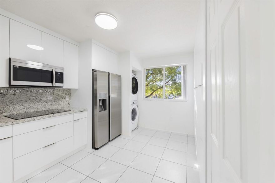 Townhouse-style condo in a low-rise, two-story community near Miami Lakes. Bright and well-maintained 2BD/2BA layout featuring a brand-new kitchen with ample storage, recessed lighting, in-unit washer and dryer and a clean, modern feel throughout. Two assigned, numbered parking spaces included — a rare advantage in this community. No pet restrictions and no leasing restrictions, offering excellent flexibility for end users and investors alike. Strong rental potential and an attractive alternative for buyers seeking the Miami Lakes lifestyle without the Miami Lakes price tag.