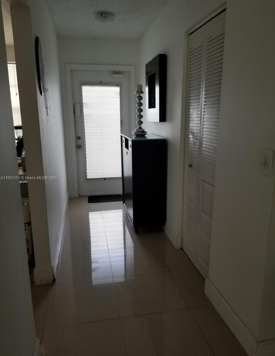 12 OF PALM SPRINGS 2 COND - Residential Lease