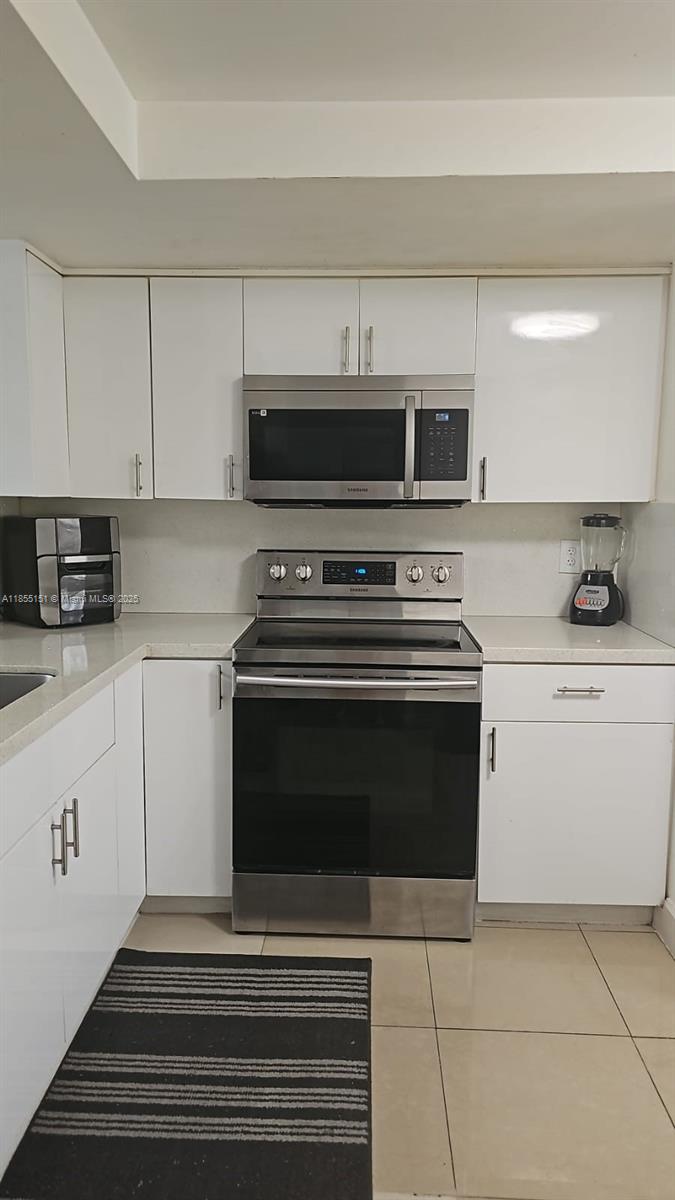 12 OF PALM SPRINGS 2 COND - Residential Lease