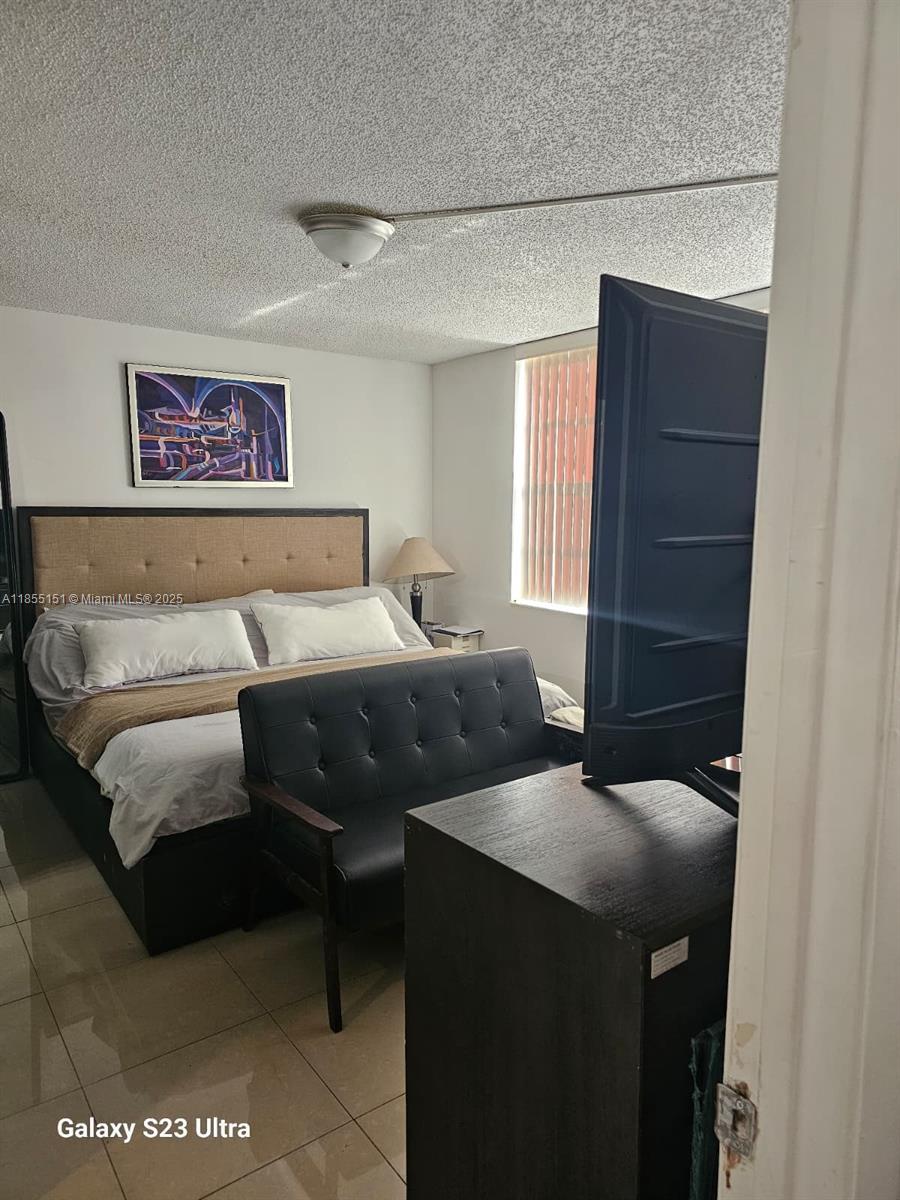 12 OF PALM SPRINGS 2 COND - Residential Lease