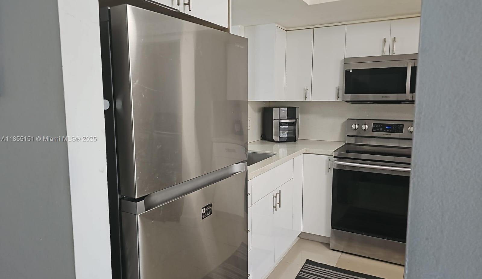 12 OF PALM SPRINGS 2 COND - Residential Lease