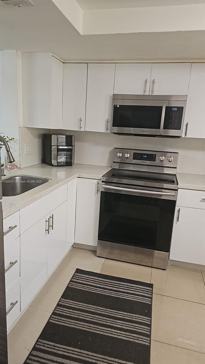 12 OF PALM SPRINGS 2 COND - Residential Lease