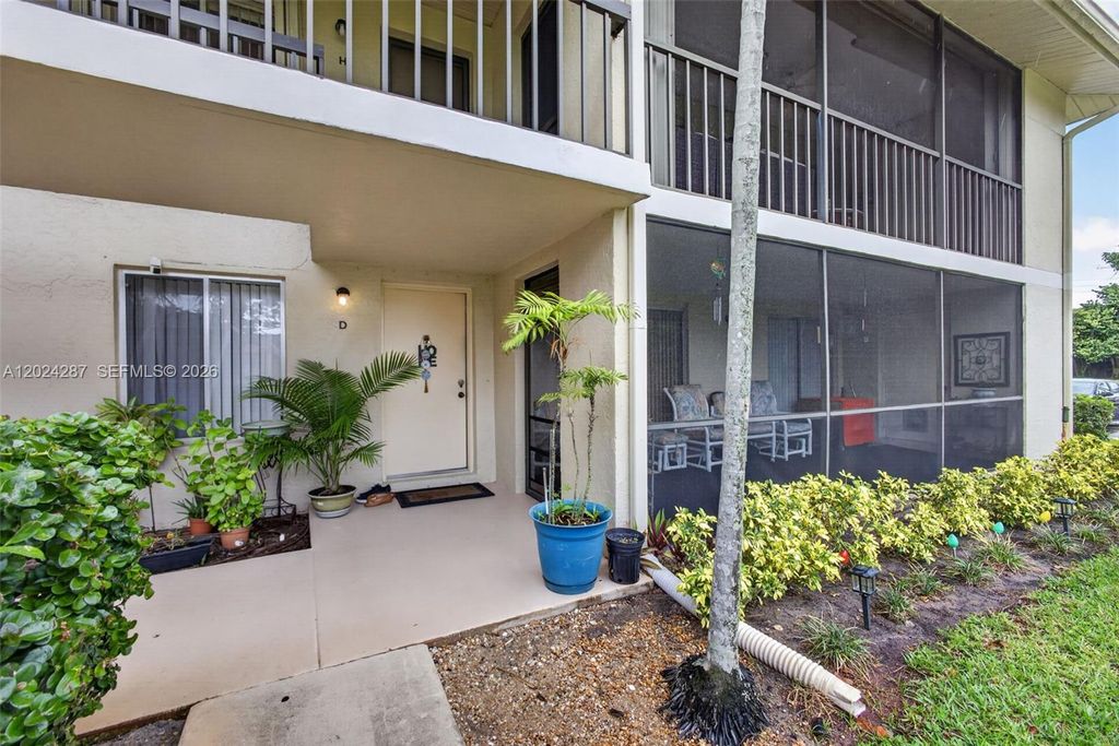 Photo of 6555 Chasewood Dr #D, Jupiter, FL 33458 (MLS # A12024287)