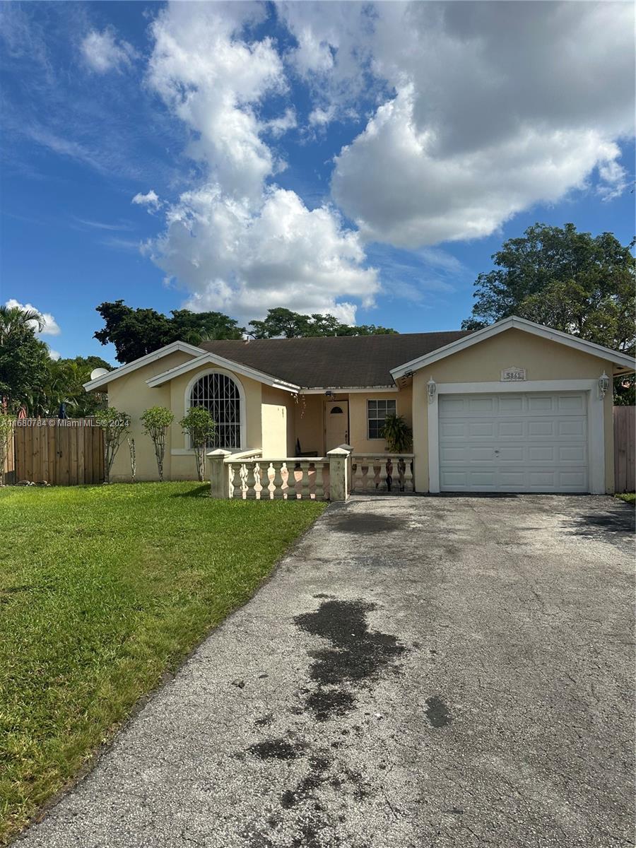 NO HOA!! A great opportunity to own a 4 bedroom, 3 bath home in the vibrant Kendall neighborhood.
features an open-concept layout connecting the living room, dining area and kitchen. Tile floors thru-out. Needs a bit of TLC mainly cosmetic. Spacious fenced in yard. The BUILT IN EFFICENCY/IN-LAW SUITE offers privacy and convenience, ideal for extended family.
Close to restaurants, shopping, parks and  A+ schools.  Motivated Seller. No HOA!!! .