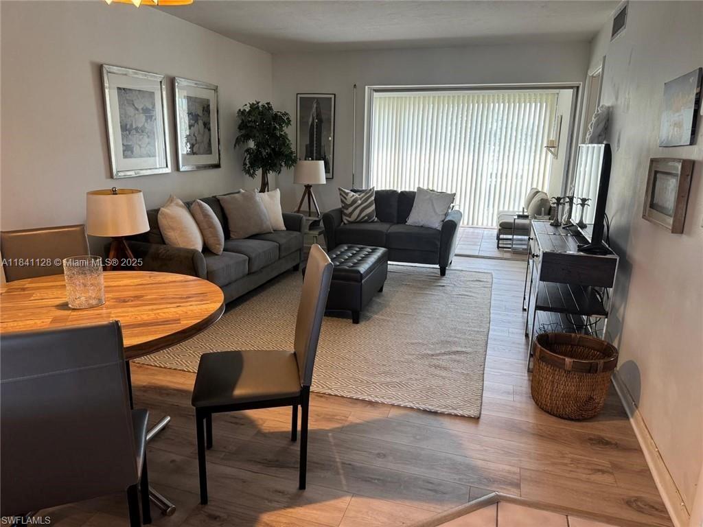 Fully furnished 2-bedroom, 2-bath condo located in the highly desirable Moorings neighborhood. This bright, top-floor unit features tile flooring throughout, an open living/dining layout, and a spacious screened lanai with peaceful garden views. Enjoy the convenience of covered assigned parking, shared laundry, and access to a community pool. Just west of US-41, you’re minutes from the beach, Venetian Village, downtown Naples, shopping, and dining. No pets. Available for immediate occupancy pending association approval.