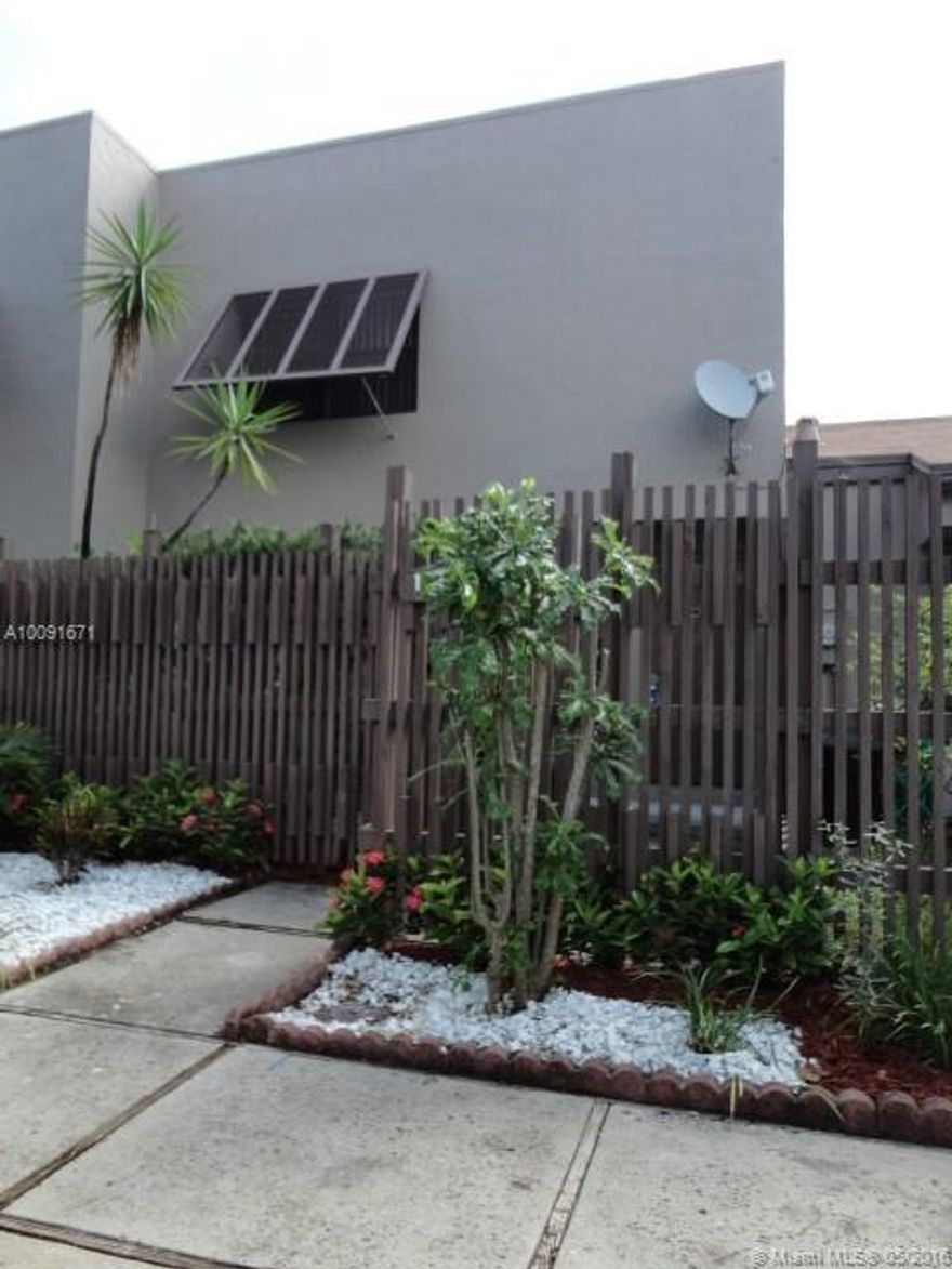 GORGEOUS 3/2 1/2 TOWNHOUSE WITH MAGNIFICENT WIDE LAKE VIEW ... LARGE SCREENED PATIO AND PRIVATE FRONT PORCH ... UPGRADED KITCHEN WITH GRANITE COUNTER TOP... NEWER APPLIANCES ... RENOVATED BATHROOMS... NEW LIGHT FIXTURES ... LOTS OF CLOSET... CLEAN AND SPACIOUS ... GATED COMMUNITY OFFERS 2 POOLS, TENNIS, FITNESS CENTER & MORE ... GREAT LOCATION NEAR I-75, PEMBROKE LAKES MALL, CB SMITH PARK AND MEMORIAL HOSPITAL WEST.  JUST READY FOR YOU TO MOVE RIGHT IN!