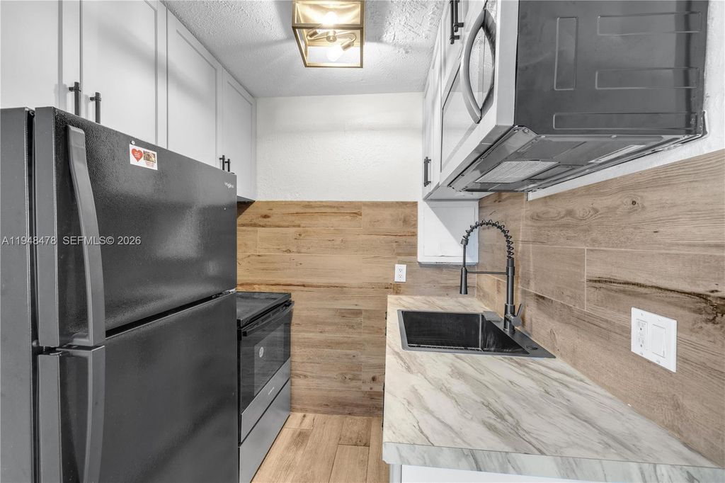 Photo of 822 N 20th Ave, Hollywood, FL 33020 (MLS # A11948478)