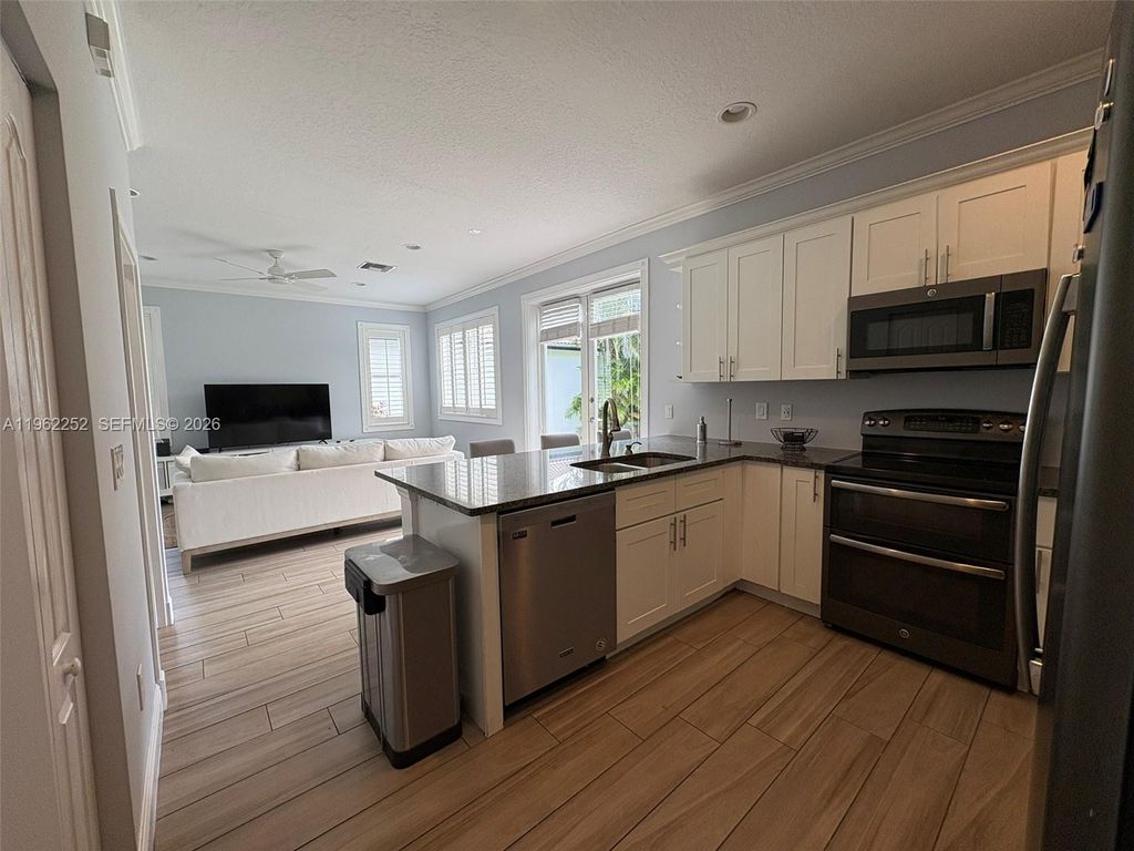 Photo of 10793 Oak Bend Way, Wellington, FL 33414 (MLS # A11962252)