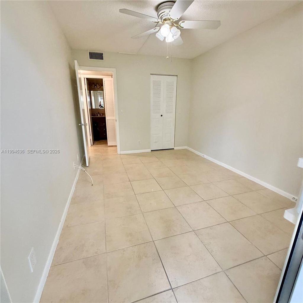 Photo of 13300 SW 1st St #104O, Pembroke Pines, FL 33027 (MLS # A11994536)