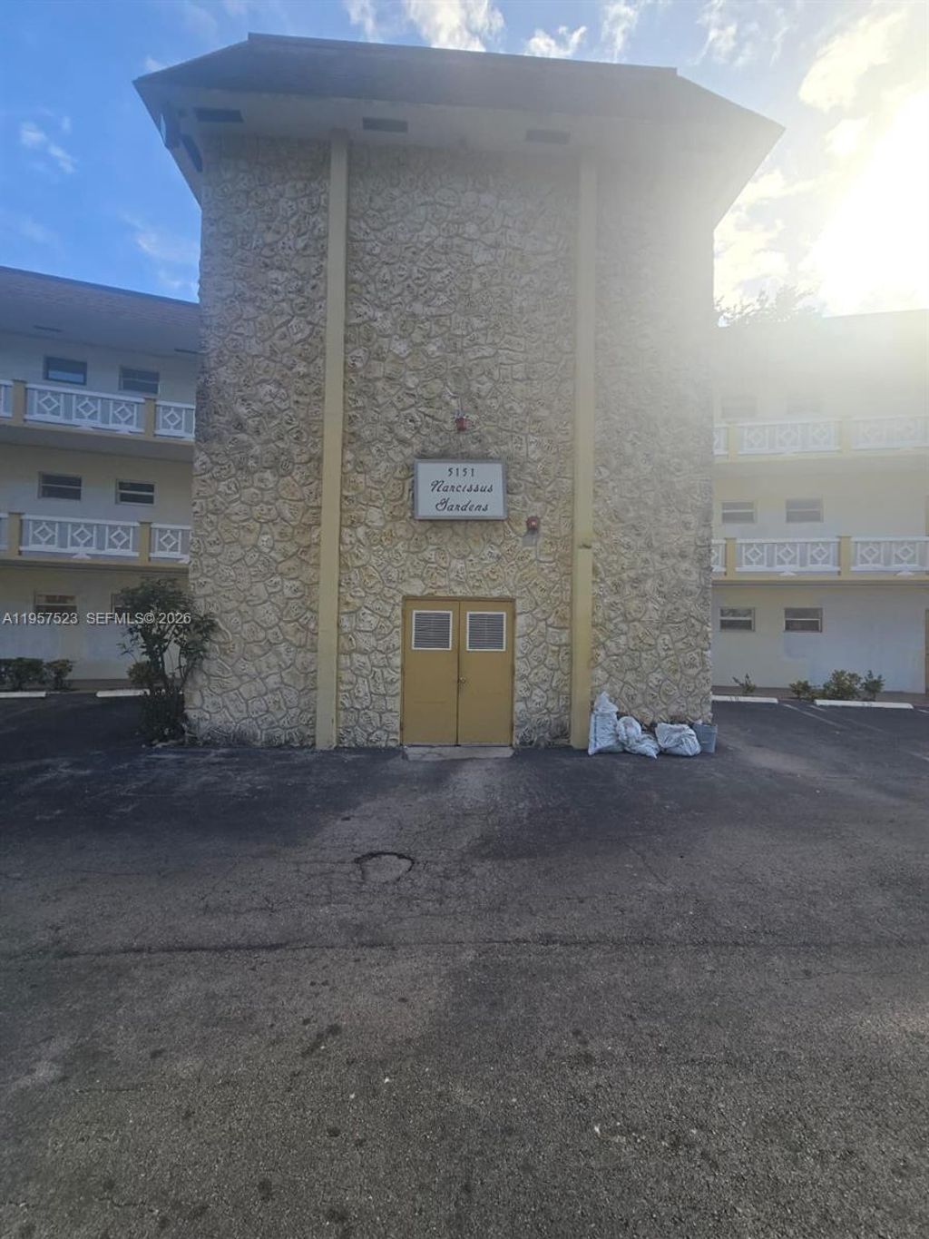 Photo of 5151 W Oakland Park Blvd #303, Lauderdale Lakes, FL 33313 (MLS # A11957523)