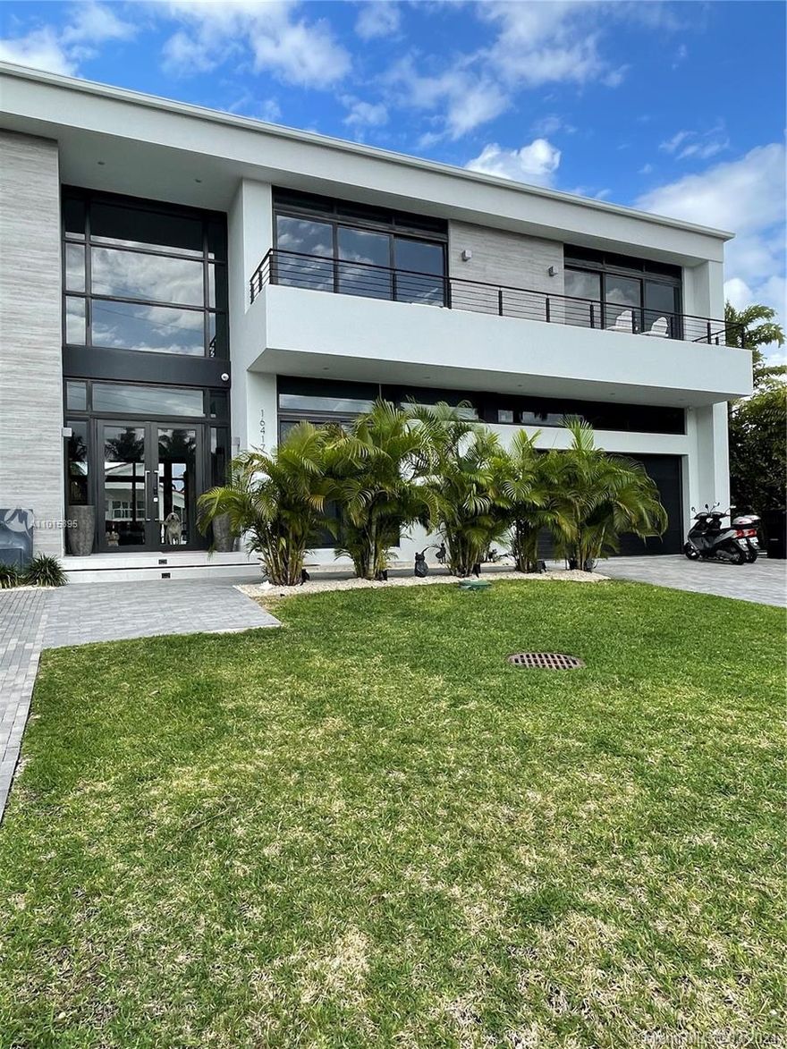 FAMILY RELOCATING, BUILT IN 2017, ONLY LIVED IN ONE YEAR. THIS IS A MODERN TWO STORY SMART HOME WITH AN ELEVATOR, SIX BEDROOMS, SEVEN AND ONE HALF BATHS, MIA CUCINA KITCHEN WITH QUARTZ COUNTER TOPS, WOLF GAS RANGE TOP AND ELECTRIC OVENS INCLUDING MICROWAVE, A BUILT IN SUB ZERO BEVERAGE/WINE COOLER AND REFRIGERATOR, ELECTRIC ROLL DOWN SHADES, VIDEO PROJECTOR WITH LARGE SCREEN, HEATED POOL WITH FULL CABANA BATH, GENERATOR, CUSTOM CLOSETS, SPACIOUS MASTER SUITE WITH BALCONY, LOTS OF NATURAL LIGHT, 80 FEET OF WATERFRONT WITH A NEW CONCRETE DOCK AND A TWO CAR GARAGE.
MINUTES TO INTRACOASTAL WATERWAY AND OCEAN ACCESS.