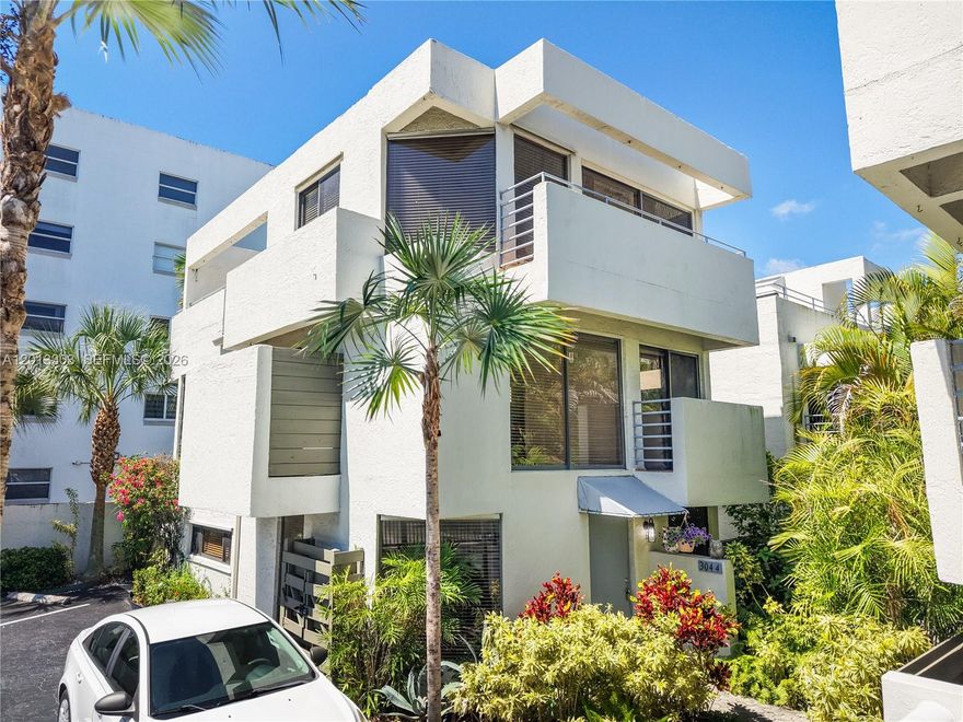 Artists and lovers of natural light will love this three level Townhouse Style condo..  As you enter the main level you are immediately embraced by the feeling of openness offered by the vistas of the  private walled tropical patio.  The living room, dining area, kitchen and walled patio are all on the main level.  Ascend the spiral stairs to the 2nd floor with guest bedroom and bath and laundry area. The primary suite with bath is located on the 3rd level. This is a serious Seller, all reasonable written offers will be considered.  Agents, please see Broker Comments.