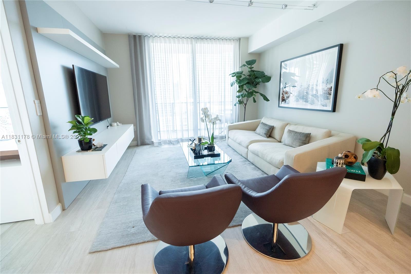 Move-in ready luxury at Brickell Heights! This impeccably furnished 1BD+DEN/2BA unit lives like a 2-bedroom, with a bedroom that can function as a custom high-end walk-in closet. Features include full mirrored master bath, smart home upgrades with Lutron switches and Nest thermostat, and Toto washlet. Designer furnishings from Anima Domus. Open kitchen with premium appliances, elegant finishes, and floor-to-ceiling windows showcasing vibrant city views. Enjoy access to rooftop pool, Equinox gym, spa, kids’ room, theater, and 24/7 concierge. Steps from Brickell City Centre. Artwork/personal items negotiable.