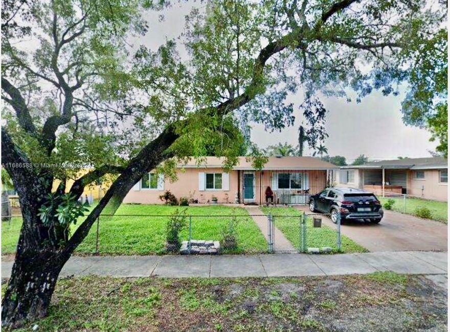Beautiful single family 3BR 2 BA home. Don't miss this opportunity to make this home your own . Large back yard for entertaining or building a pool. Close to the Hard Rock Stadium and shopping.