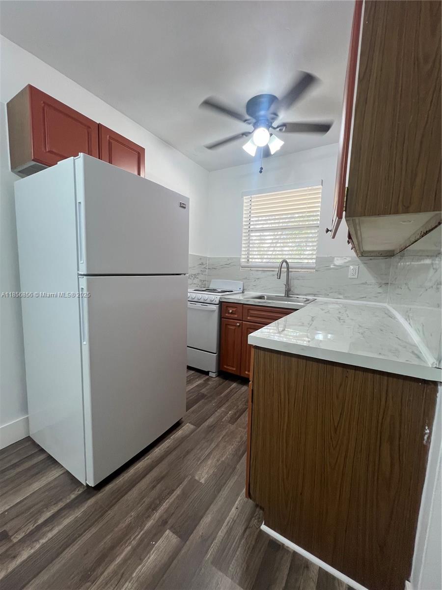 1 bedroom, 1 bathroom located in the heart of Hialeah! This ample apartment features laminate flooring, freshly painted walls and open kitchen. Includes water and one assigned parking. Washer/dryer room separately available on premises. Additional $25 monthly pet fee for small breed. Minutes away from shopping plazas and major highways.