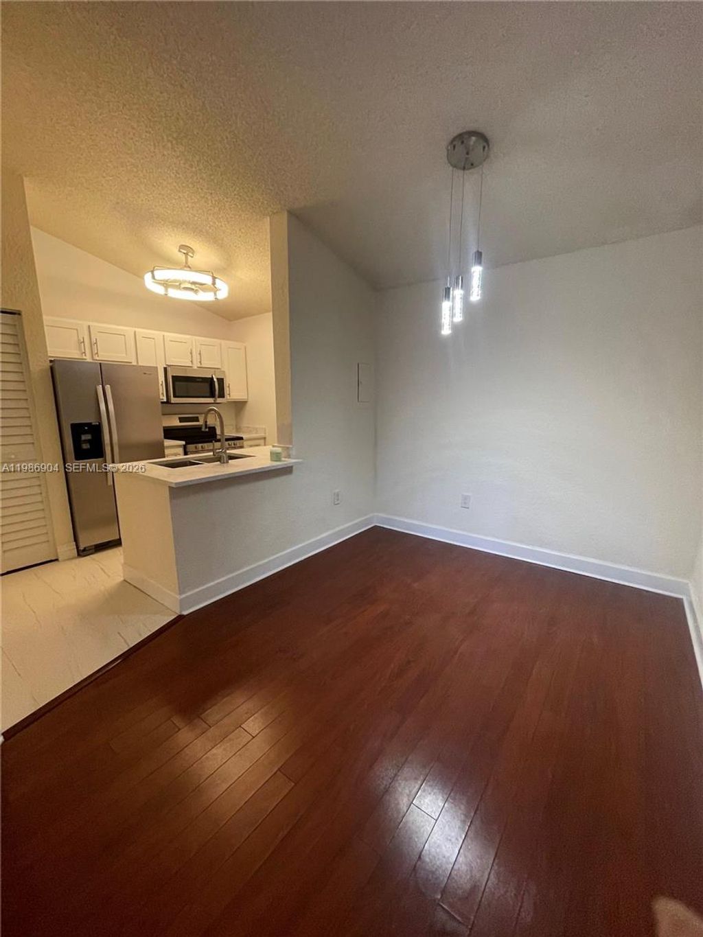 Photo of 2851 N Oakland Forest Dr #305, Oakland Park, FL 33309 (MLS # A11986904)
