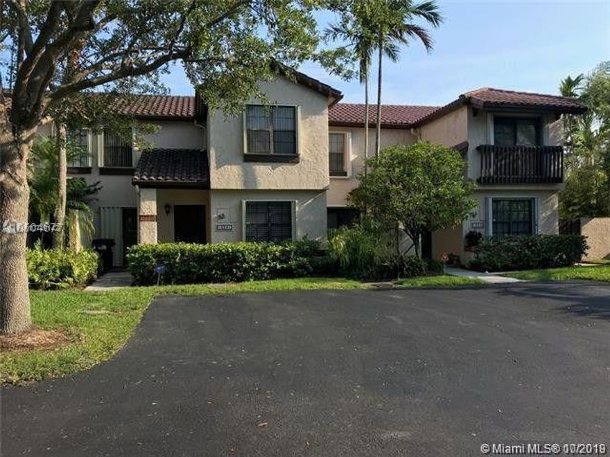 Beautiful light and bright 2 story townhouse with fenced patio in fantastic Falls gated community. This unit features all tile floors throughout the first and second floor. Large kitchen with plenty of cabinets. Stainless Steel appliances, full size washer and dryer. One bedroom downstairs also full bathroom downstairs that has been redone recently. Large walk in closet in the master bedroom. Large patio great for entertaining. Parking right in front of your unit. Very quiet neighborhood. Community pool. Freshly painted!