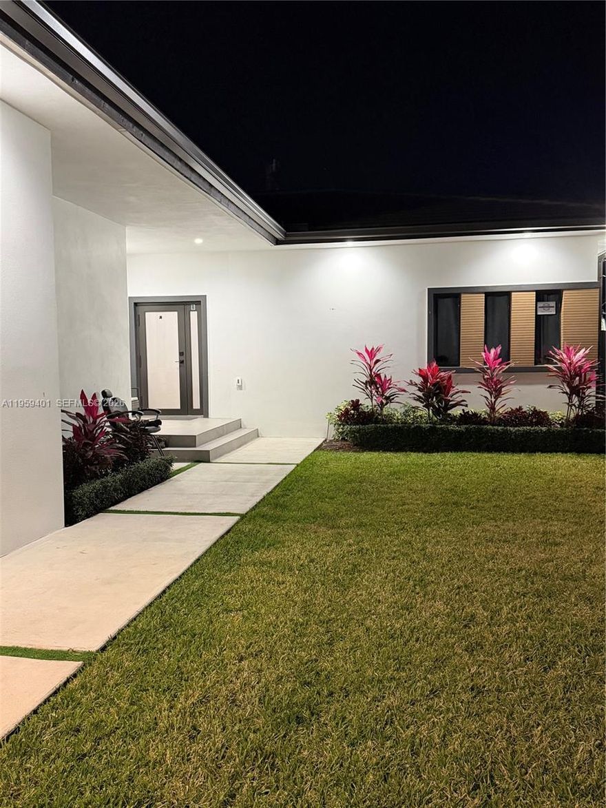 Beautifully constructed in 2025, this 3-bedroom, 2-bathroom residence offers 1,450 square feet of modern living with brand-new features throughout, including the roof, flooring, kitchen, AC, and more. The stunning kitchen showcases stainless steel appliances, a spacious island ideal for cooking and dining, and is enhanced by abundant natural light as well as thoughtfully placed LED lighting. Modern laminate flooring flows seamlessly throughout the home. The exterior is accented with contemporary tile finishes, adding to its sleek curb appeal. Additional features include high-impact windows and doors, as well as an in-unit washer and dryer for added convenience.