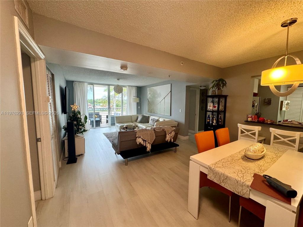 Photo of 2711 Ocean Club Blvd #202, Dania Beach, FL 33019 (MLS # A11976293)