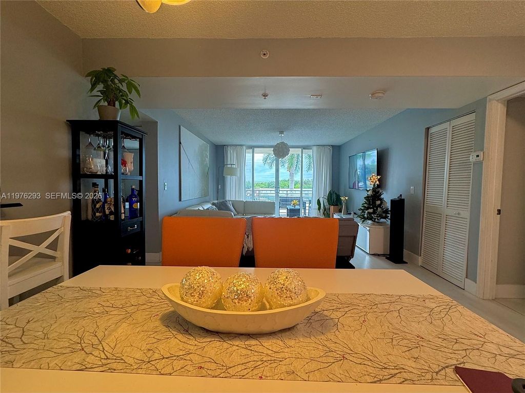 Photo of 2711 Ocean Club Blvd #202, Dania Beach, FL 33019 (MLS # A11976293)