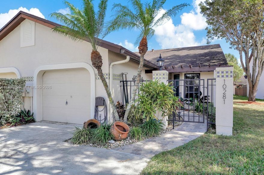 Welcome to this fully updated corner townhome in the desirable Valencia community in the heart of Kendall. This light-filled residence features impact windows and doors, high ceilings, and an open-concept layout. Enjoy a private terrace with pergola and direct access to a grassy area. The primary suite offers a walk-in closet and ensuite bath, while the den with private exterior entrance can be used as a third bedroom or office. Includes new stackable washer and dryer, and small storage area in garage. Well-maintained community with low HOA fees, offering a pool and park. Conveniently located near A-rated schools, shopping, dining, and major highways.