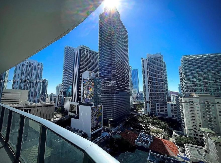 Beautiful 2BD + den corner unit in Brickell Heights East with stunning city, bay & ocean views. Floor-to-ceiling windows, sleek porcelain floors, modern kitchen with Italian cabinetry & built-ins. Spacious wraparound balcony accessible from living room & both bedrooms. Den works perfectly as an office or guest area. Premium building designed by Arquitectonica & David Rockwell featuring 2 resort-style pools, spa, fitness center, media room, business center, 24/7 concierge & security. Best line in the building with exceptional views. Includes two deeded parking spaces, no valet fees. Prime Brickell location steps to BCC, Mary Brickell Village, dining & shops. Leaseback option available, offering immediate income potential.
