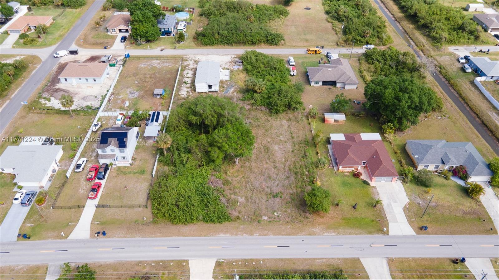 This vacant lot offers a prime opportunity to build your ideal home in a rapidly developing community. The property is in a tranquil neighborhood, providing a peaceful living environment while maintaining proximity to essential amenities. Nearby schools include G. Weaver Hipps Elementary School (2.7 miles away), Veterans Park Academy For The Arts (2.8 miles), and Lehigh Senior High School (4.3 miles), making it an excellent choice for families. The lot's convenient access to major highways ensures easy commutes to shopping centers, dining establishments, and recreational facilities. With its desirable location and growth potential, this lot presents a valuable investment for those looking to build a custom residence tailored to their preferences.