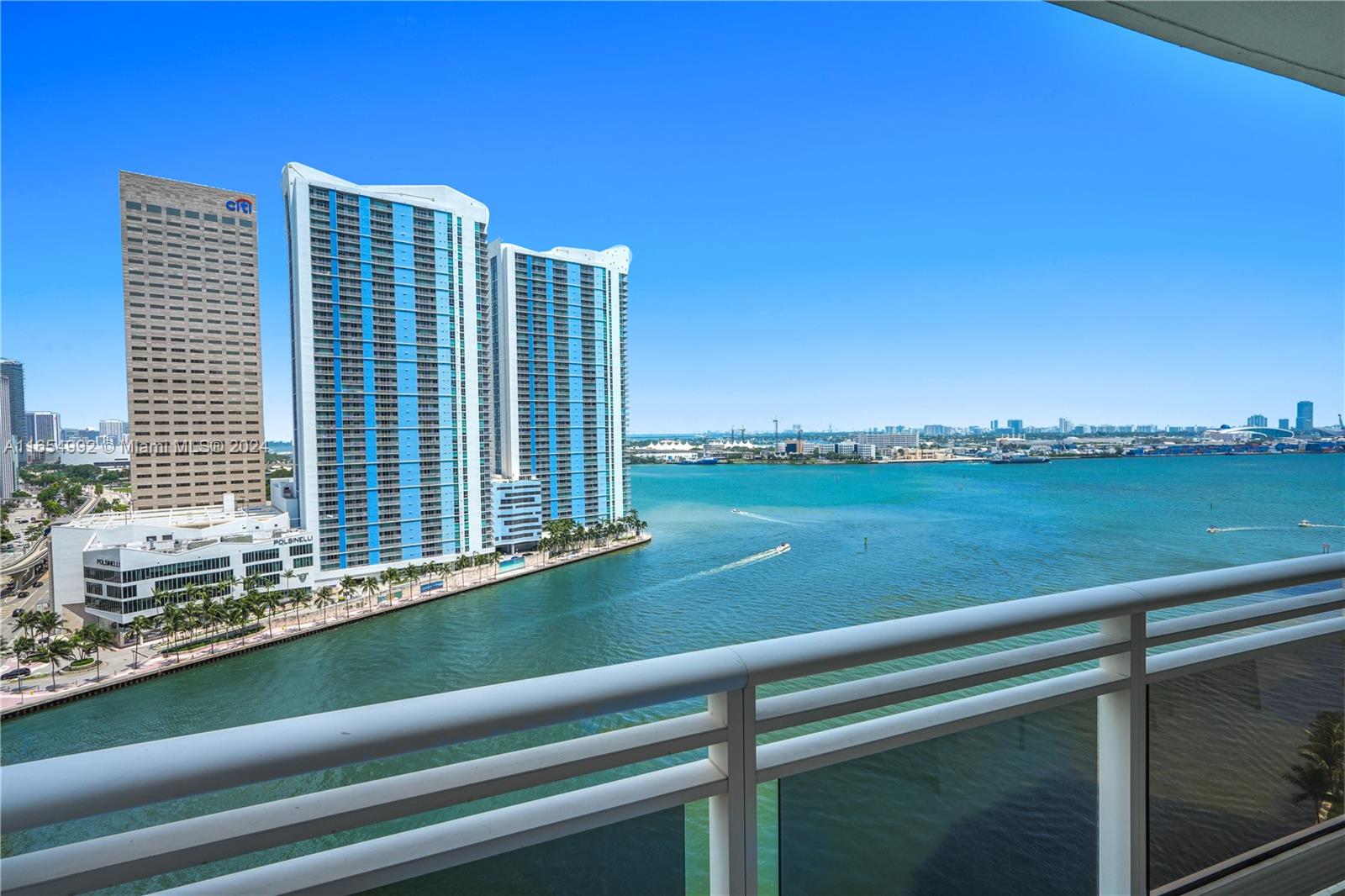 The largest 2 bedroom unit in luxurious Carbonell on exclusive Brickell Key Island. Fully furnished. Enjoy island life with incredible water views. Split floor plan offers privacy for both bedrooms. Carbonell offers top amenities including 2 tennis courts, golf putting area, indoor racquetball court, indoor basketball court, heated swimming pool great for lap swimming, jacuzzi, BBQ area, private childs playroom, party room, conference room, computer room, 2 story gym with the latest equipment. Brickell Key offers top amenities with a short bridge leading you from private island life to exciting restaurants and nightlife.