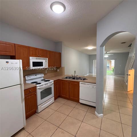 Photo of 8811 S Isles Cr Cir #8811, Tamarac, FL 33321 (MLS # A12063091)