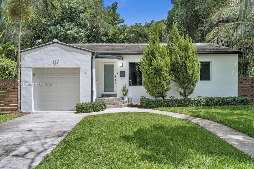 Enveloped in lush greenery on a quarter acre lot, this impeccably upgraded 3-bed, 2-bath sanctuary offers rare tranquility just minutes from Miami’s most vibrant districts. A fully fenced yard reveals a resort-style heated saltwater pool, hot tub, and expansive deck for effortless entertaining. Inside, refined comforts abound—heated bidets, reverse osmosis water filtration, and smart lighting and motorized shades elevate daily living. Garage and driveway accommodate 2–3 vehicles. Perfectly positioned near The Citadel, Upper Buena Vista, the Design District, and premier dining and shopping. Experience privacy, style, and convenience in one exceptional home.