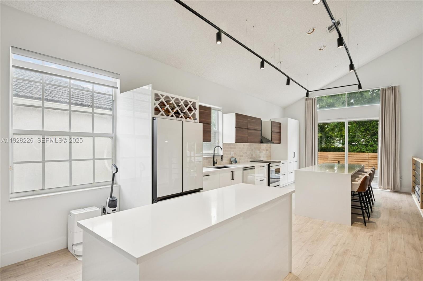 View photos, virtual tours, details... 15694 NW 12th Ct