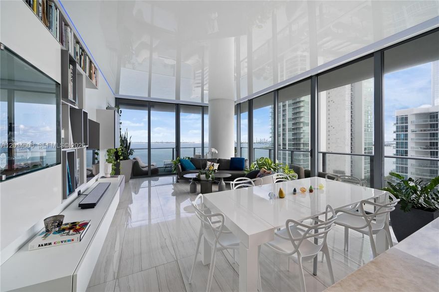 Introducing a truly magnificent and elegant corner unit at Gran Paraiso, offering breathtaking bay and ocean views, complemented by the enchanting cityscape at night. This 4-bedroom, 4.5-bathroom haven boasts wraparound terraces, floor-to-ceiling windows, inviting natural light, and panoramic views. With arrival via private elevator access to 10 foot high ceilings and an open concept floor plan, this residence exudes an air of spaciousness and sophistication. The beautiful Italian kitchen design features high-end appliances including a Sub-Zero refrigerator and velum ceiling with parameter lights. Resort lifestyle, with access to a spa, state-of-the-art fitness center, bowling alley, tennis court, putting green and multiple pools.