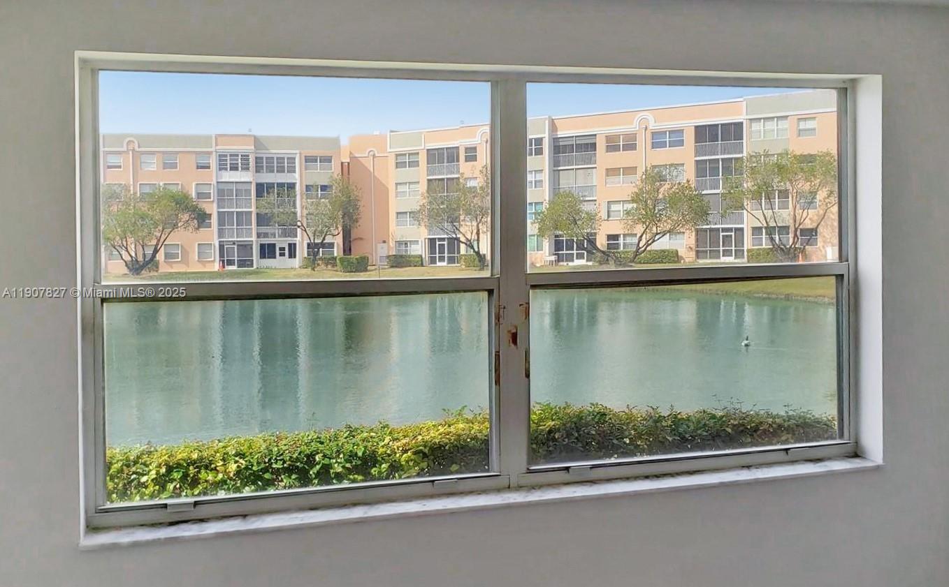 SUNRISE LAKES 203 CONDO - Residential