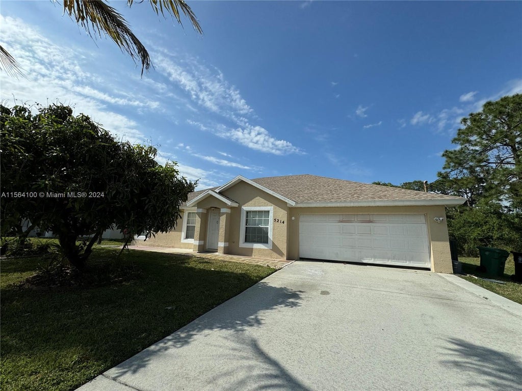 Photo of 5214 NW Mulga Ct, Port Saint Lucie, FL 34986 (MLS # A11564100)