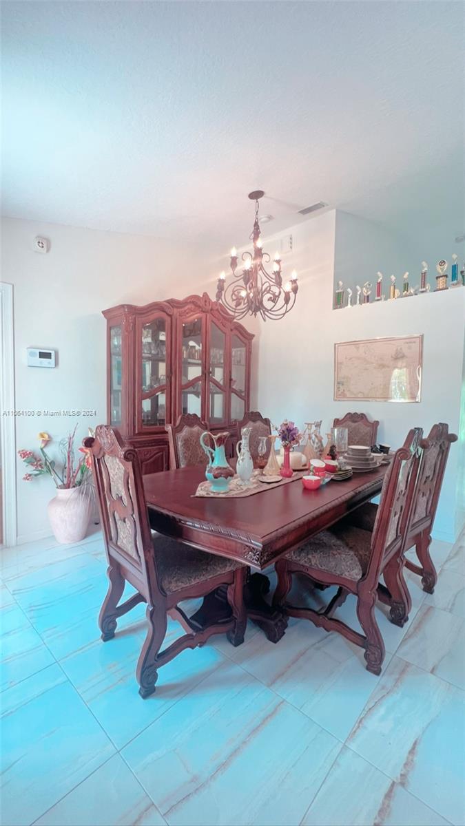 Photo of 5214 NW Mulga Ct, Port Saint Lucie, FL 34986 (MLS # A11564100)
