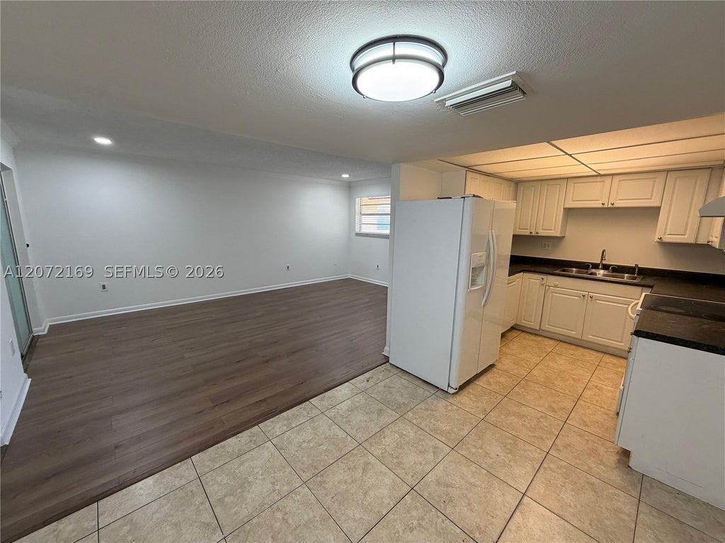 Photo of 11101 Royal Palm Blvd #203, Coral Springs, FL 33065 (MLS # A12072169)