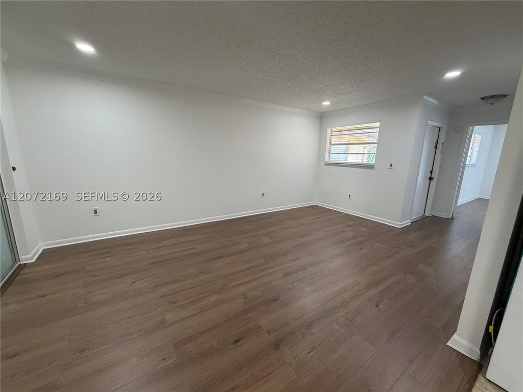 Photo of 11101 Royal Palm Blvd #203, Coral Springs, FL 33065 (MLS # A12072169)