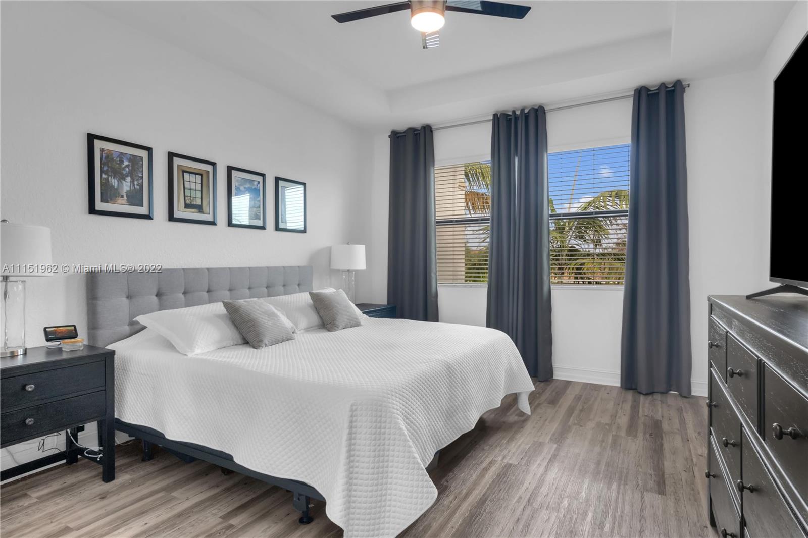 Beautifully appointed 3 bed, 2.5 bath two floor townhouse built in 2017 with alarm circuitry & water softener. Modern cabinetry & fixtures including SS appliances in the kitchen and ceiling fans throughout. Kitchen also boasts a spacious pantry & sits besides an open great room that leads outside to a covered lanai. Spacious master has huge, nicely upgraded walk-in closet with double basins and large shower with bench. Laundry is perfectly located on the second floor next to bedrooms. Home has a 2 car covered garage & driveway that accommodates 2 more + guest parking in front. Raintree has on site management & includes a gym, heated swimming pool & clubhouse. The community is in easy reach of shopping, dining & many other services & less than 10 minutes from the I75. A great place to live!